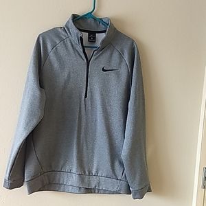 Gray Nike 1/4 zip in great condition.